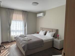 Ένα ή περισσότερα κρεβάτια σε δωμάτιο στο Cozy place for nights