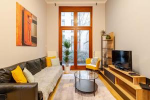 Televízia a/alebo spoločenská miestnosť v ubytovaní Pillow Heaven Budapest