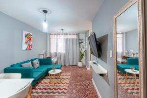 TV a/nebo společenská místnost v ubytování Comodos apartamentos en el centro de Santa Marta