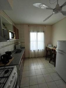 Kuchyň nebo kuchyňský kout v ubytování Ideal Place con cochera techada