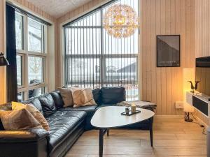 Posezení v ubytování 8 person holiday home in Roslev-By Traum