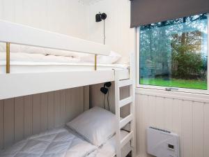 Postel nebo postele na pokoji v ubytování Family Fun in Arrild - By Traum Ferienwohnungen