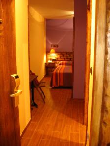 Postel nebo postele na pokoji v ubytování Hostal Xaloa Orio