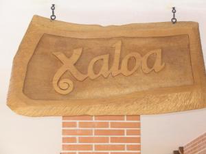 Certifikát, hodnocení, plakát nebo jiný dokument vystavený v ubytování Hostal Xaloa Orio
