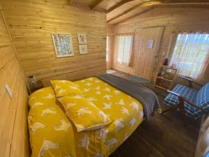 Rúm í herbergi á Serás Libre Refugio