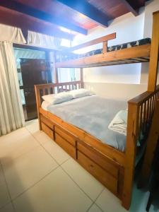 Postel nebo postele na pokoji v ubytování Laguna Beach vista para a piscina