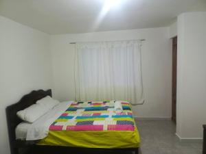 Postel nebo postele na pokoji v ubytování Hotel CasaBlanca"Tablon de miraflores"