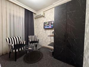 TV a/nebo společenská místnost v ubytování 716 Pendik Suit OTEL