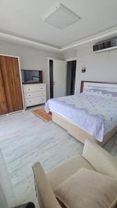 Postel nebo postele na pokoji v ubytování Vnz alacati