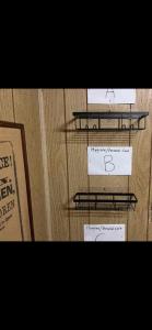 a group of three shelves with signs on them at Tarawa drive in Cincinnati +22 photos