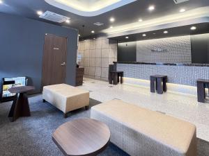 TV a/nebo společenská místnost v ubytování Hotel Route-Inn Shimodate