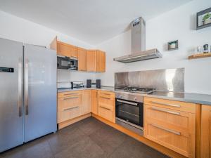 Kuchyňa alebo kuchynka v ubytovaní Chalet Kirchberg L