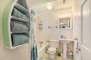 a small bathroom with a toilet and a sink at Waterfront Panacea Vacation Rental with Dock! in Panacea +27 photos