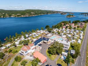 an aerial view of a resort next to the water at 4 person holiday home in Risør in Risør