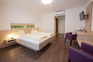 Postel nebo postele na pokoji v ubytování Hotel zur Pfalz