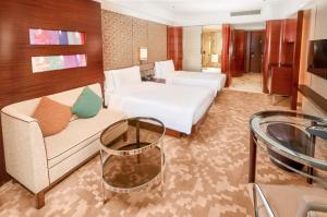 Televiisor ja/või meelelahutuskeskus majutusasutuses Crowne Plaza Macau by IHG