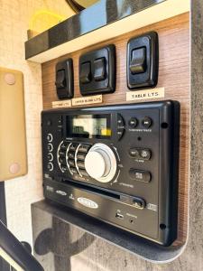 a radio sitting on top of a wall at Navi- HUGE yard- MEGA playset- CUTE RV in Willmar
