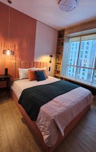 Ένα ή περισσότερα κρεβάτια σε δωμάτιο στο Terracotta in Esil Riverside