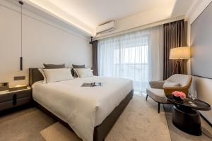 枫雨酒店公寓华强北店-Fengyu Hotel Apartment Shenzhen Huaqiang North Subway Station Branch客房内的一张或多张床位