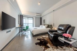 Posezení v ubytování 枫雨酒店公寓华强北店-Fengyu Hotel Apartment Shenzhen Huaqiang North Subway Station Branch