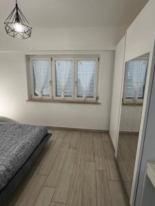 Ein Bett oder Betten in einem Zimmer der Unterkunft Elegant & Spacious 2BR 2BA Unit with Private Patio