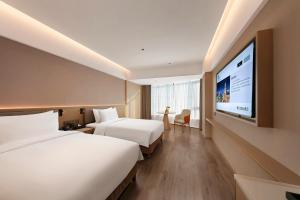 Imagen de la galería de Madison Zhengzhou CBD, en Zhengzhou 29 fotos más
