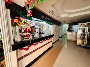 a store with a christmas display in a mall at Pattaya inn hotel in Pattaya South