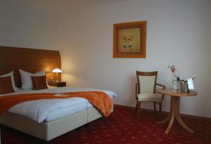 Postel nebo postele na pokoji v ubytování Hotel zur Pfalz