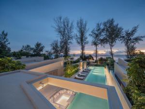 an overhead view of a swimming pool on a building at Veyla Natai Residences - Luxury Pool Villa in Khok Kloi