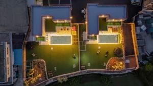 an aerial view of a building with lights on it at Pause Kids Pool Viila in Yeosu