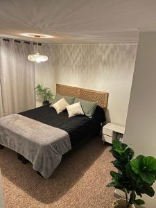 Postel nebo postele na pokoji v ubytování Departamento valle de Peñuelas