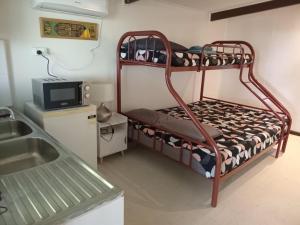 Postel nebo postele na pokoji v ubytování Cosy Farmstay Jasmeeruls Bayt Tuvurara, Savusavu