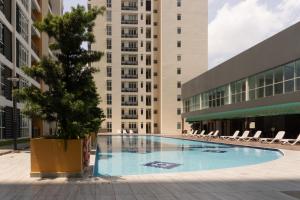 an empty swimming pool in front of a building at Ksl C2 3R3B 1-5pax #Daya#Austin#Ikea#Aeon in Johor Bahru