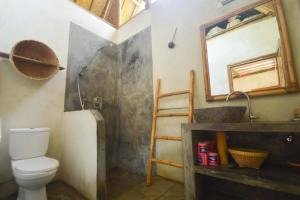 Vannituba majutusasutuses Tipsea Turtle Gili Air