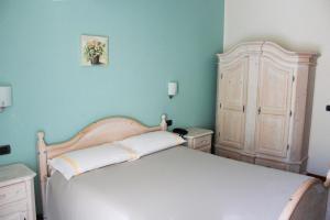 Llit o llits en una habitació de Hotel Sole