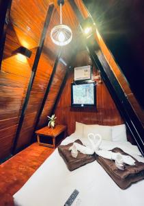 a bedroom with a bed in a small room at The Zen Villas Resort in Lipa +60 photos