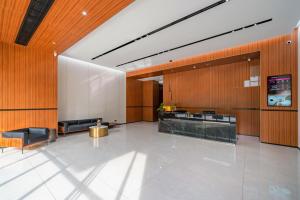Posezení v ubytování Tonglu City Center Rosery Hotel