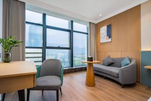 Posezení v ubytování Tonglu City Center Rosery Hotel