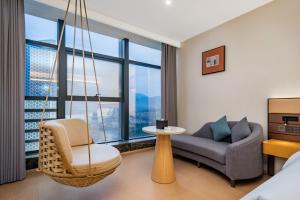 Posezení v ubytování Tonglu City Center Rosery Hotel