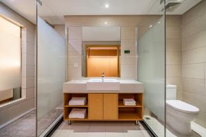 Koupelna v ubytování Tonglu City Center Rosery Hotel