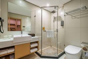Koupelna v ubytování Tonglu City Center Rosery Hotel