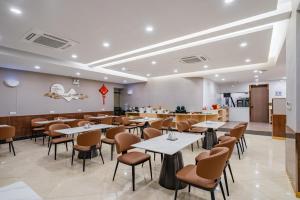 Restaurace v ubytování Tonglu City Center Rosery Hotel