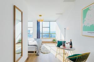 Qingdao Shanhaiji Sea View B&B Wusi Square Branch的休息区