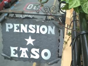 a sign on the side of a street at Pensión Easo in San Sebastián