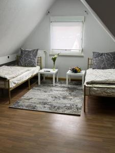Postel nebo postele na pokoji v ubytování Schelder Gästezimmer