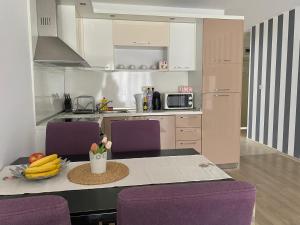 A kitchen or kitchenette at Apartments in complex ATIA RESORT