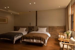 One Zen Lodge Snowy Haven客房内的一张或多张床位