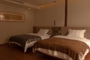 One Zen Lodge Snowy Haven客房内的一张或多张床位