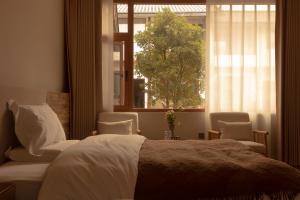 One Zen Lodge Snowy Haven客房内的一张或多张床位