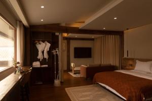 One Zen Lodge Snowy Haven客房内的一张或多张床位